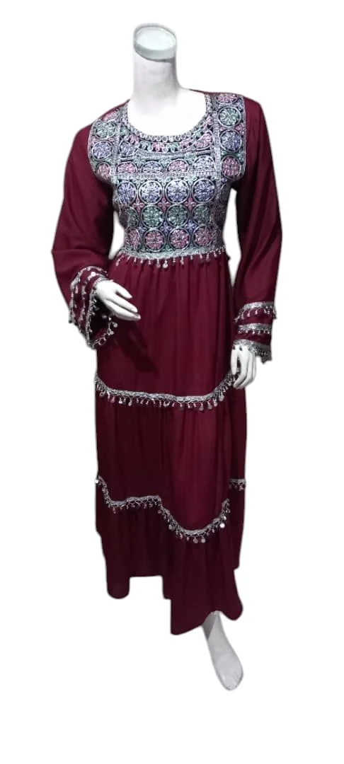 maroon Afghani Gand dress with intricate embroidery, wide sleeves, and a flowing traditional design, crafted from luxurious fabric."