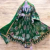 Traditional Afghani Gand dress with intricate embroidery, mirror work, and vibrant colors, representing Afghan cultural heritage."