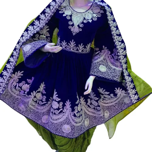 Half Afghani Gand dress with intricate embroidery, mirror work, and a flowing skirt, blending traditional Afghan patterns with a modern silhouette."