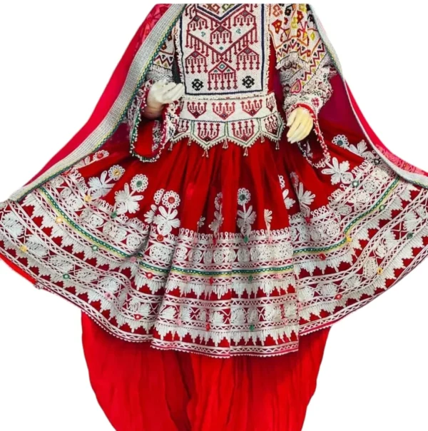 half Afghani Gand dress with intricate embroidery, wide sleeves, and a stylish blend of tradition and modern fashion."