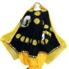Half Afghani Gand dress with intricate embroidery, mirror work, and a flowing skirt, blending traditional Afghan patterns with a modern silhouette."