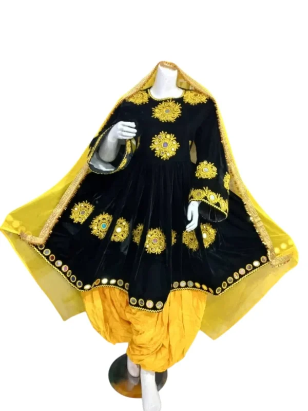 Half Afghani Gand dress with intricate embroidery, mirror work, and a flowing skirt, blending traditional Afghan patterns with a modern silhouette."