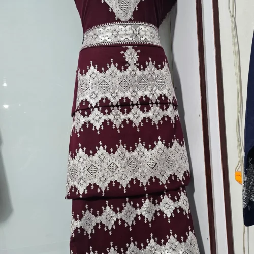 traditional Hazaragi handmade dress featuring intricate embroidery, vibrant colors, and unique handcrafted details, reflecting rich Hazara culture."