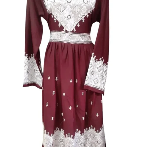 traditional Hazaragi dress with intricate embroidery, vibrant colors, and cultural patterns, reflecting the rich heritage of the Hazara people."