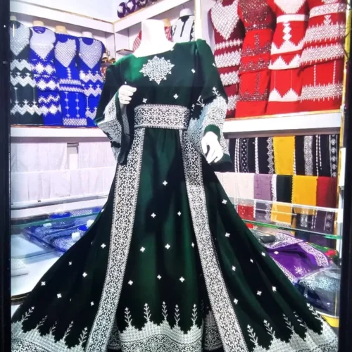 traditional Hazaragi dress with intricate embroidery, vibrant colors, and cultural patterns, reflecting the rich heritage of the Hazara people."