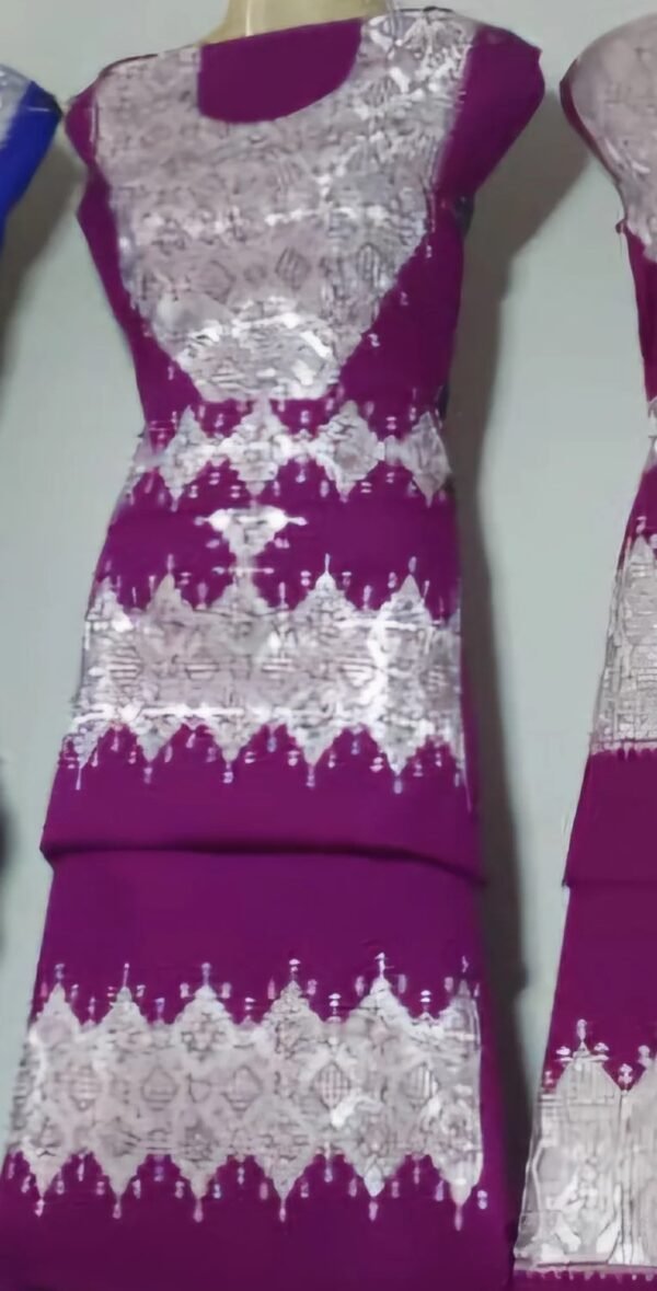 A beautifully handcrafted Hazaragi dress with intricate embroidery, beadwork, and vibrant colors, showcasing the rich cultural heritage of the Hazara people."