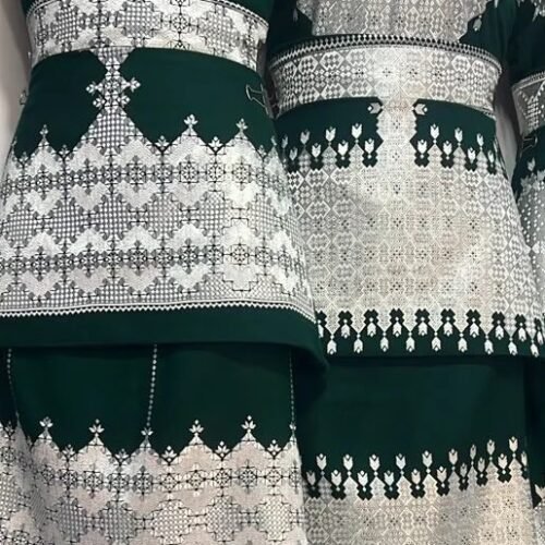 A beautifully handcrafted Hazaragi dress with intricate embroidery, beadwork, and vibrant colors, showcasing the rich cultural heritage of the Hazara people."
