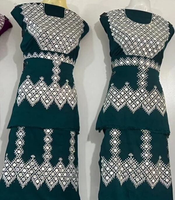 beautifully handcrafted Hazaragi dress adorned with intricate embroidery, beadwork, and vibrant patterns. Made from luxurious fabric, the dress reflects the rich cultural heritage and artisanal skills of the Hazara people.