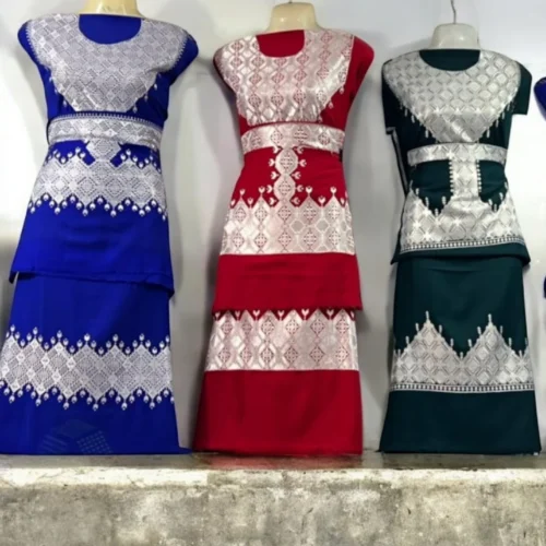 A beautifully handcrafted Hazaragi dress with intricate embroidery, beadwork, and vibrant colors, showcasing the rich cultural heritage of the Hazara people."
