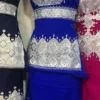 A beautifully handcrafted Hazaragi dress with intricate embroidery, beadwork, and vibrant colors, showcasing the rich cultural heritage of the Hazara people."