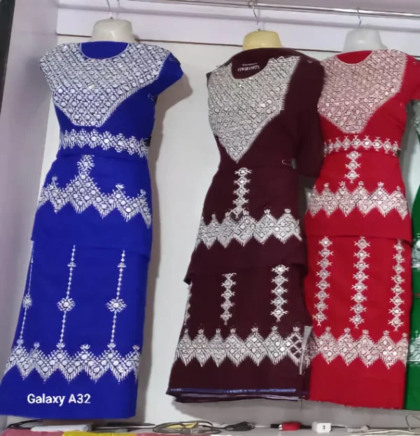 traditional Hazaragi handmade dress featuring intricate embroidery, vibrant patterns, and rich fabric, reflecting the cultural heritage of the Hazara people.