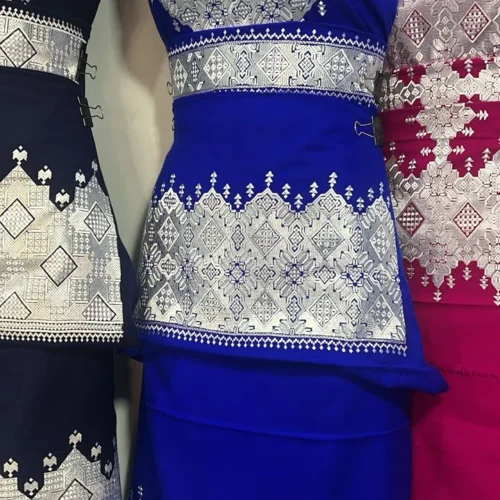 A beautifully handcrafted Hazaragi dress with intricate embroidery, beadwork, and vibrant colors, showcasing the rich cultural heritage of the Hazara people."
