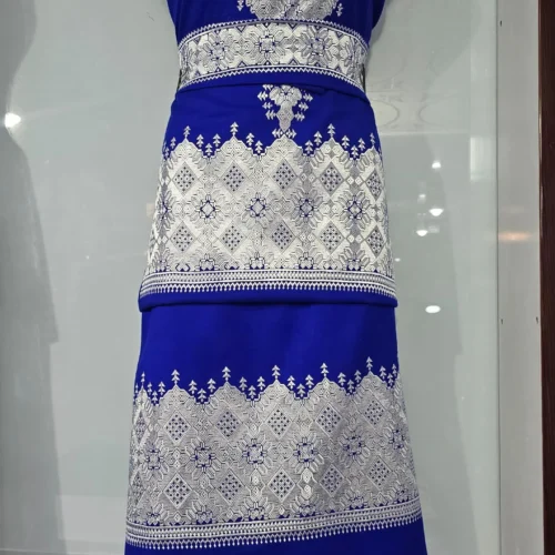 traditional Hazaragi handmade dress featuring intricate embroidery, vibrant colors, and unique handcrafted details, reflecting rich Hazara culture."