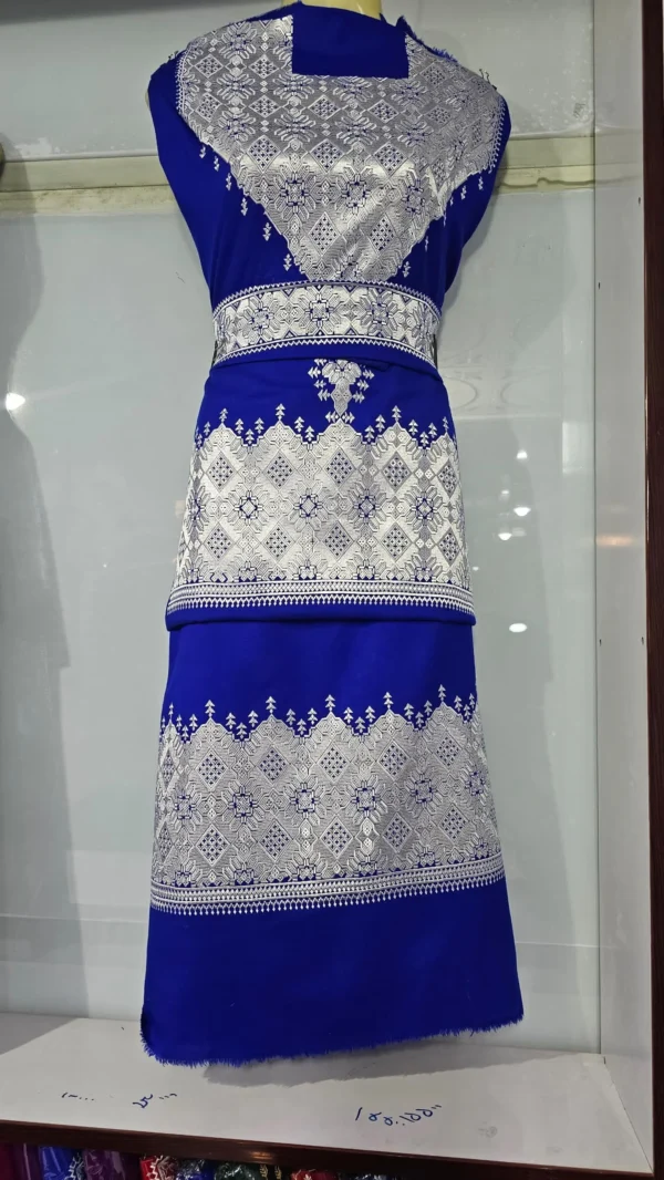 traditional Hazaragi handmade dress featuring intricate embroidery, vibrant colors, and unique handcrafted details, reflecting rich Hazara culture."