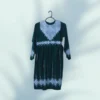 A stunning Hazaragi embroidered dress featuring intricate handmade embroidery, vibrant colors, and traditional beadwork, reflecting the rich cultural heritage of the Hazara people."