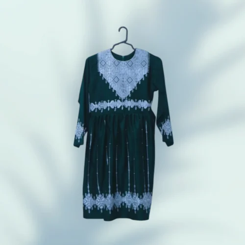 A stunning Hazaragi embroidered dress featuring intricate handmade embroidery, vibrant colors, and traditional beadwork, reflecting the rich cultural heritage of the Hazara people."