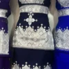 "A beautifully handcrafted Hazaragi dress with intricate embroidery, beadwork, and vibrant colors, showcasing the rich cultural heritage of the Hazara people."