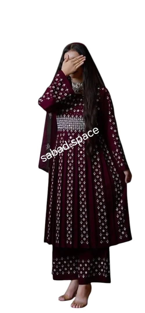 traditional Hazaragi dress with intricate embroidery, vibrant colors, and cultural patterns, reflecting the rich heritage of the Hazara people." Caption: