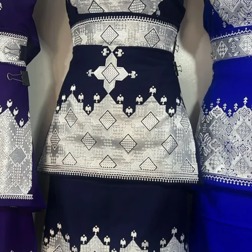 "A beautifully handcrafted Hazaragi dress with intricate embroidery, beadwork, and vibrant colors, showcasing the rich cultural heritage of the Hazara people."