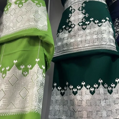 beautifully handcrafted Hazaragi dress adorned with intricate embroidery, beadwork, and vibrant patterns. Made from luxurious fabric, the dress reflects the rich cultural heritage and artisanal skills of the Hazara people.