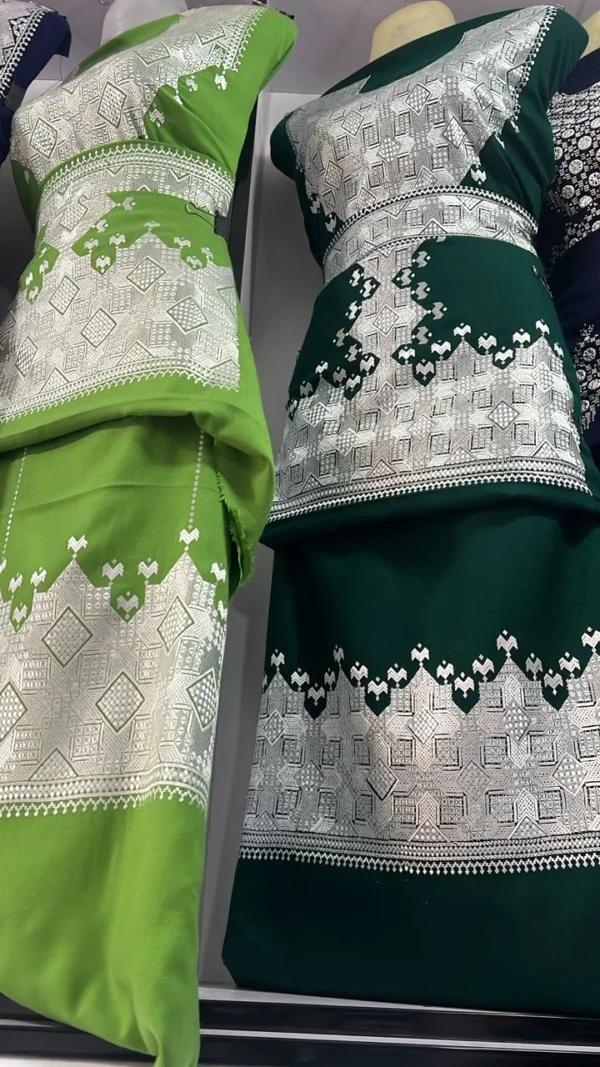 beautifully handcrafted Hazaragi dress adorned with intricate embroidery, beadwork, and vibrant patterns. Made from luxurious fabric, the dress reflects the rich cultural heritage and artisanal skills of the Hazara people.
