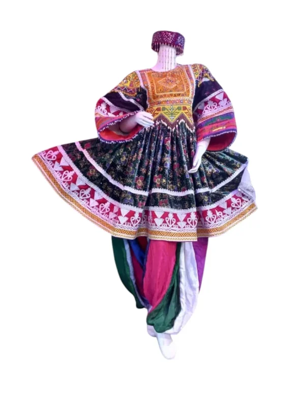Half Afghani Gand dress with intricate embroidery, mirror work, and a flowing skirt, blending traditional Afghan patterns with a modern silhouette."