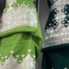 A beautifully handcrafted Hazaragi dress with intricate embroidery, beadwork, and vibrant colors, showcasing the rich cultural heritage of the Hazara people."