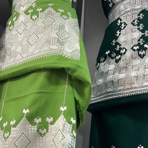 A beautifully handcrafted Hazaragi dress with intricate embroidery, beadwork, and vibrant colors, showcasing the rich cultural heritage of the Hazara people."