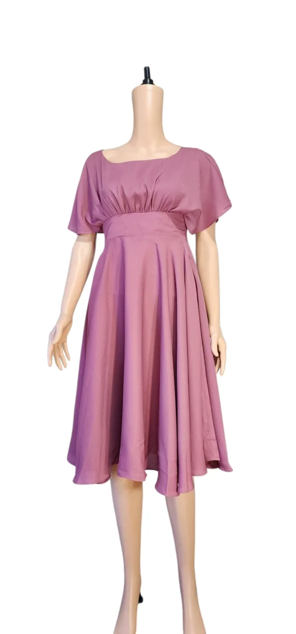 deep purple party dress with a flowing silhouette, elegant embellishments, and luxurious fabric, perfect for formal events."