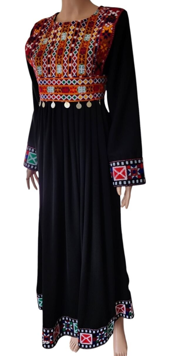 traditional Afghan dress with vibrant colors, intricate embroidery, and decorative mirrors, showcasing Afghan cultural heritage.