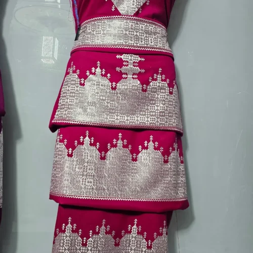 traditional Hazaragi handmade dress featuring intricate embroidery, vibrant colors, and unique handcrafted details, reflecting rich Hazara culture."