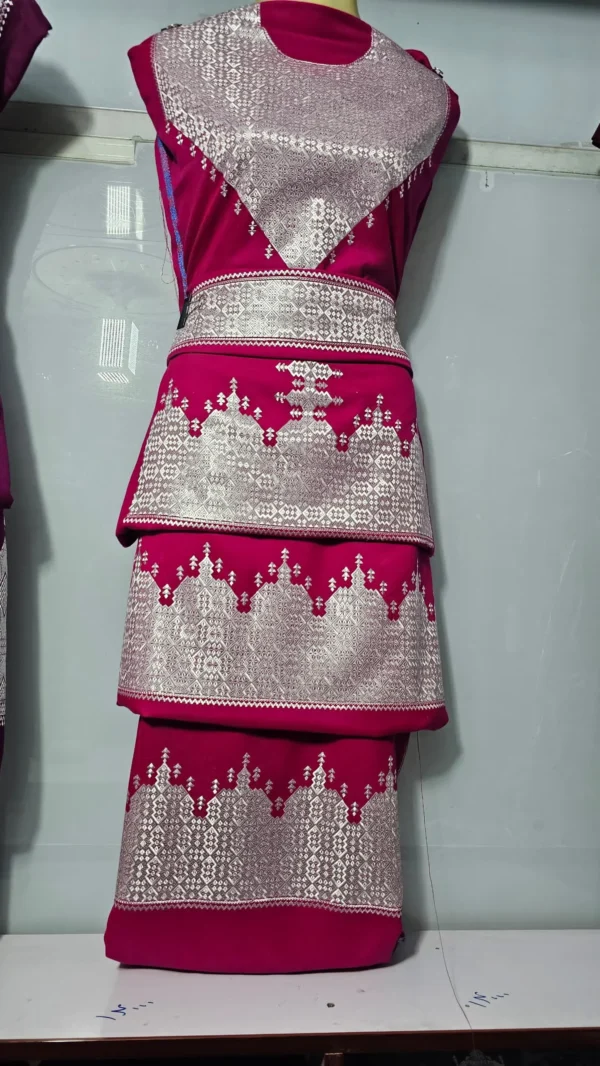 traditional Hazaragi handmade dress featuring intricate embroidery, vibrant colors, and unique handcrafted details, reflecting rich Hazara culture."