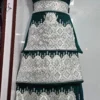 traditional Hazaragi handmade dress featuring intricate embroidery, vibrant colors, and unique handcrafted details, reflecting rich Hazara culture."