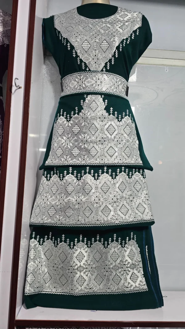 traditional Hazaragi handmade dress featuring intricate embroidery, vibrant colors, and unique handcrafted details, reflecting rich Hazara culture."