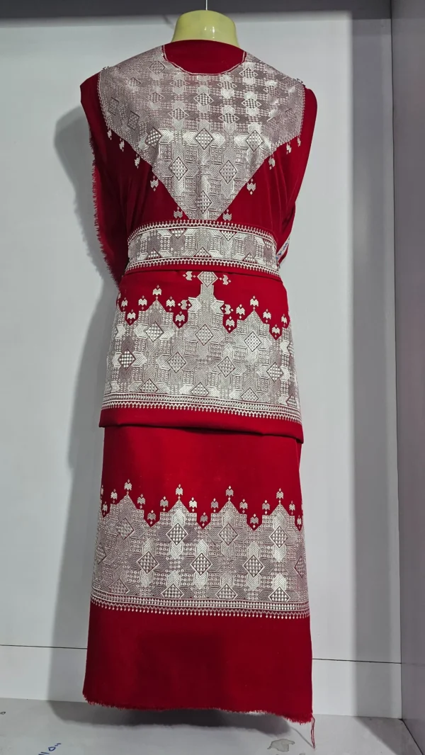 traditional Hazaragi dress with intricate embroidery, vibrant colors, and cultural patterns, reflecting the rich heritage of the Hazara people."