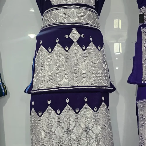 traditional Hazaragi handmade dress featuring intricate embroidery, vibrant colors, and unique handcrafted details, reflecting rich Hazara culture."