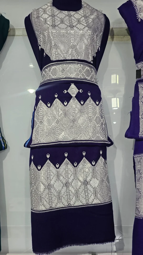 traditional Hazaragi handmade dress featuring intricate embroidery, vibrant colors, and unique handcrafted details, reflecting rich Hazara culture."